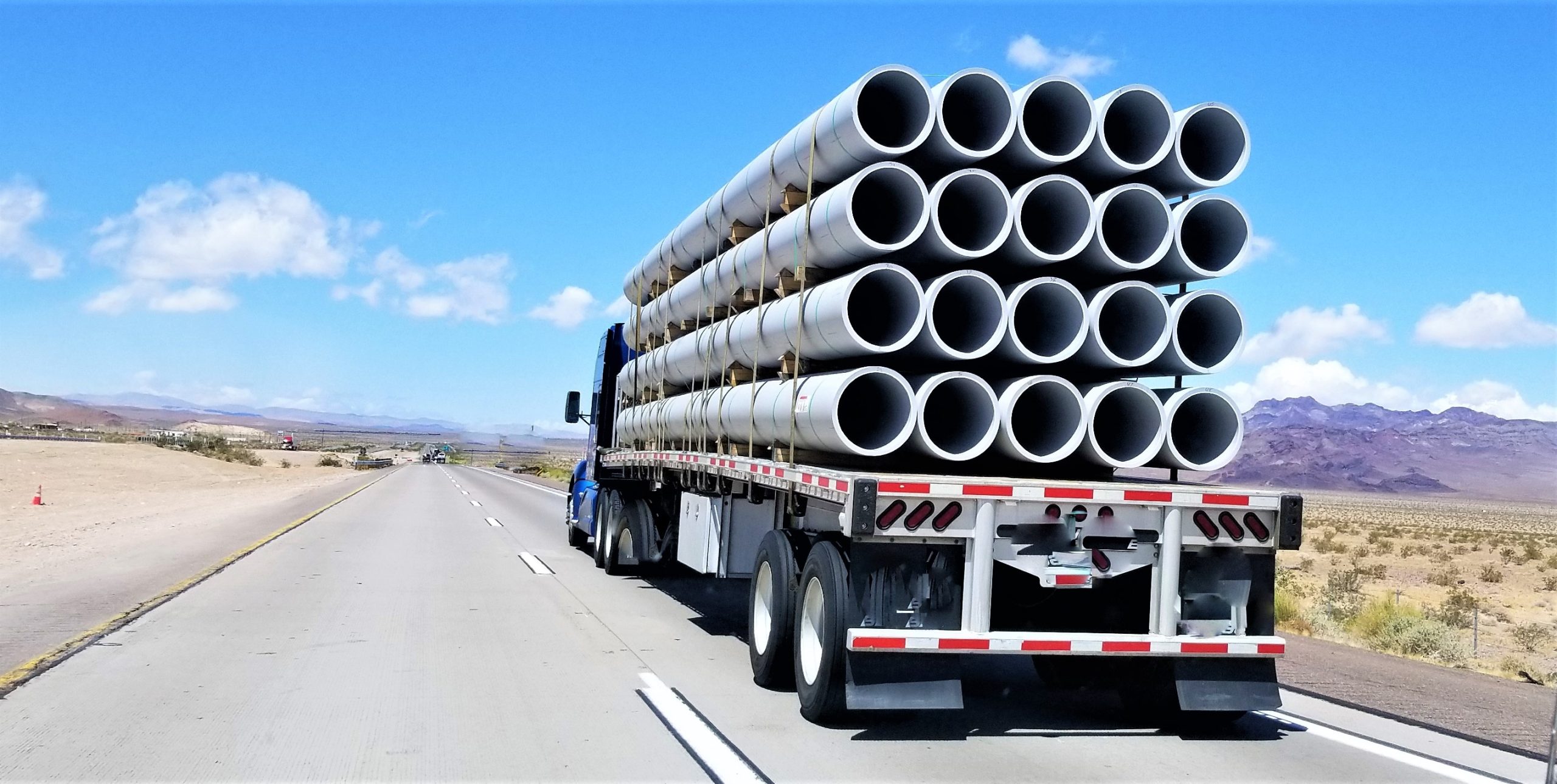 trucking-hauling-pipes-nominated-2022-11-08-03-08-11-utc