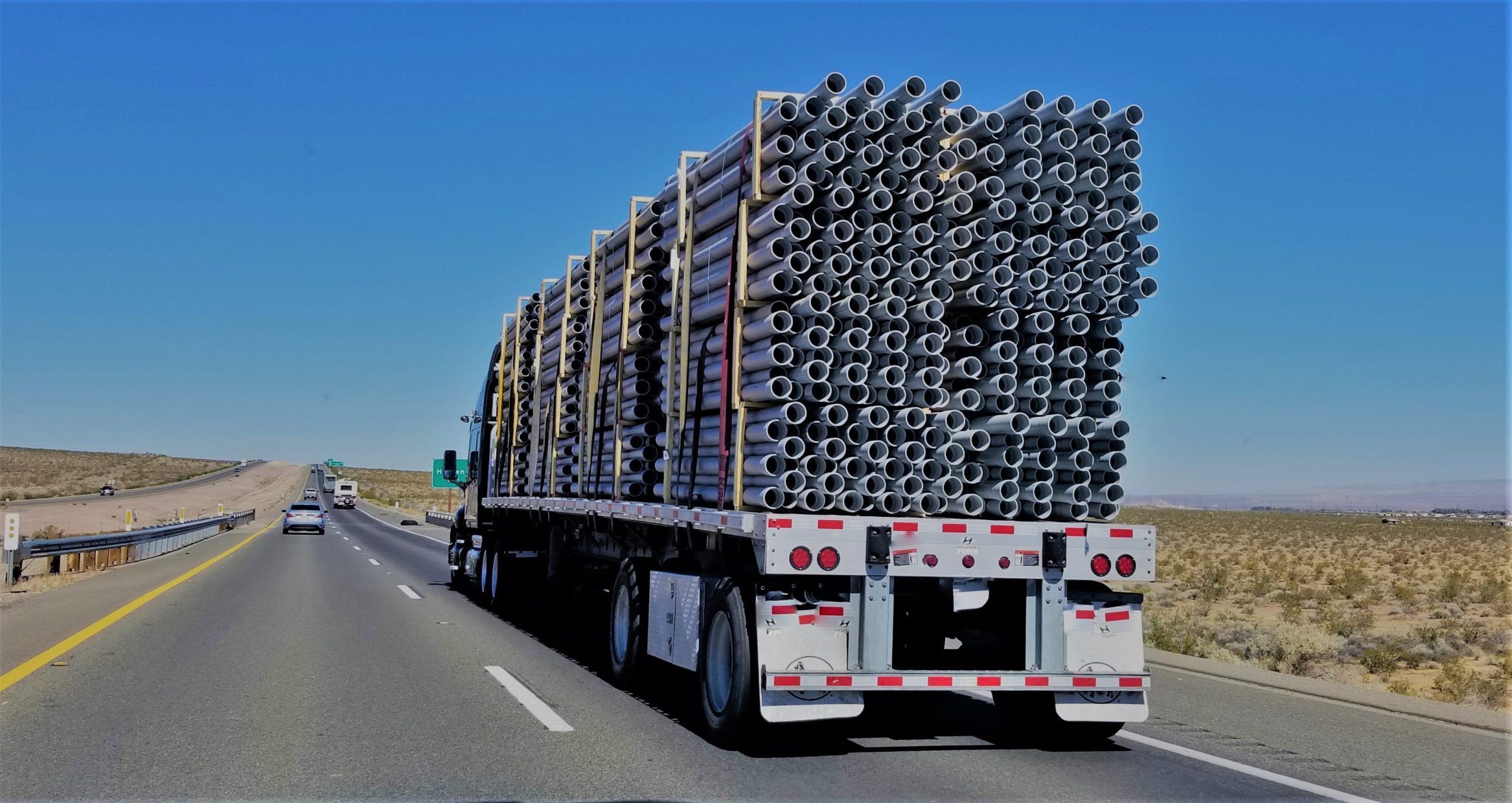 trucking-pipes-on-a-flatbed-nominated-2022-11-08-05-25-30-utc